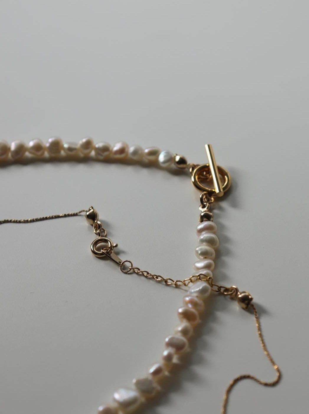 pearl pomp necklace (set)