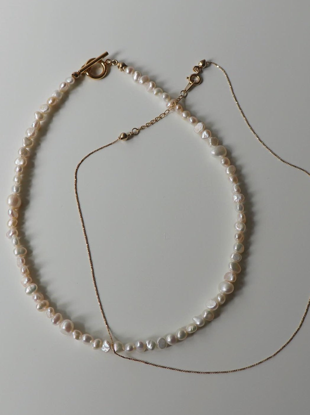 pearl pomp necklace (set)